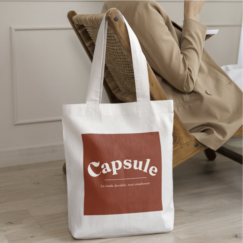 Tote bag en coton avec le logo de la marque Capsule et le slogan 'La mode durable, tout simplement